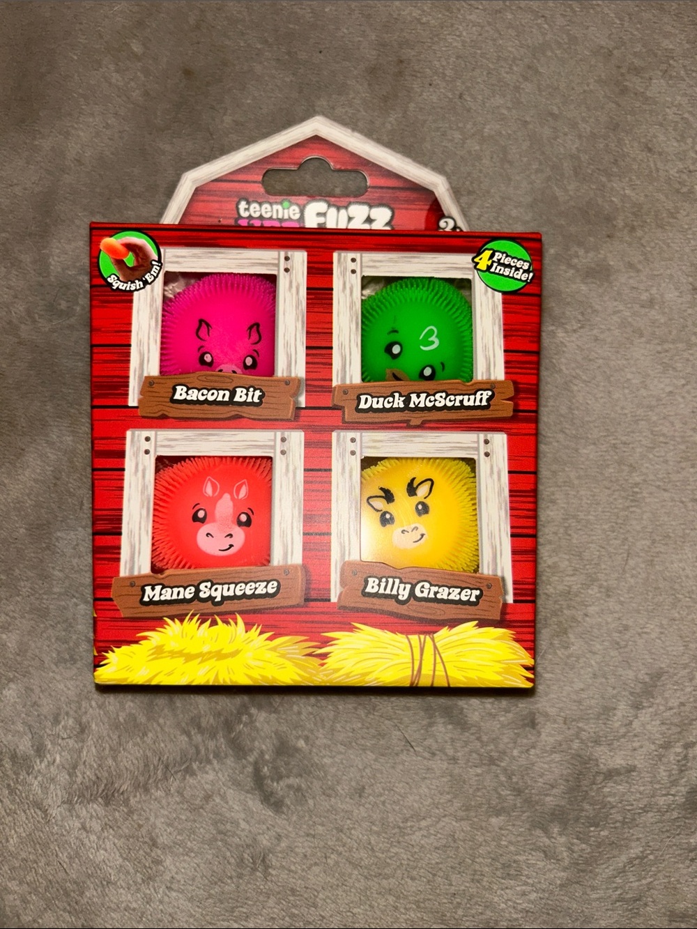 Four-Pack Squeeze Toy Set - Pink, Green, Red, Yellow